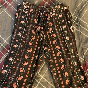 Rue 21, size:XS color: black with red and white designs!